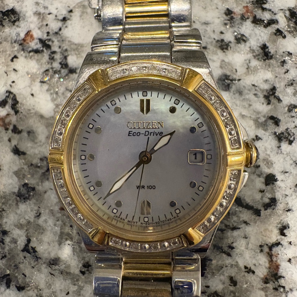 Citizen Eco-Drive Women’s Silver and Gold Tone Watch